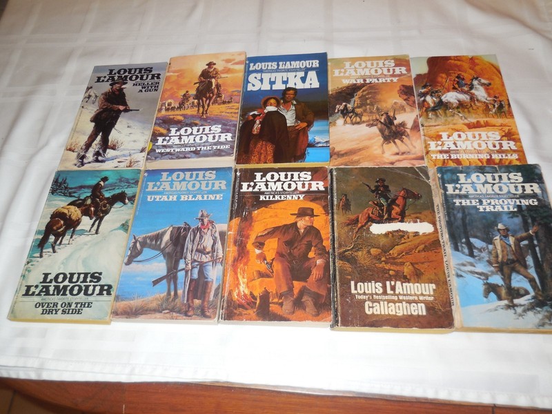 Lot of 65 Louis L'Amour western paperbacks. gallery