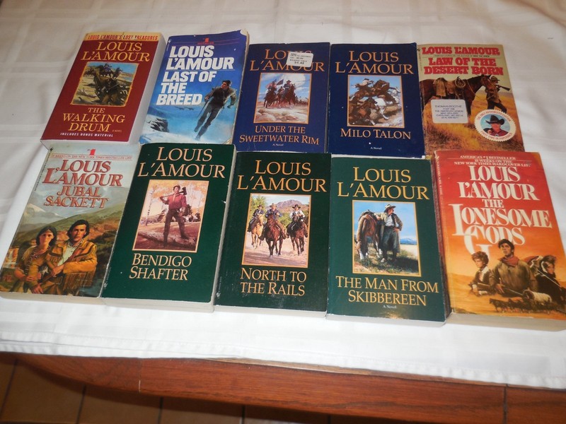 Lot of 65 Louis L'Amour western paperbacks. gallery