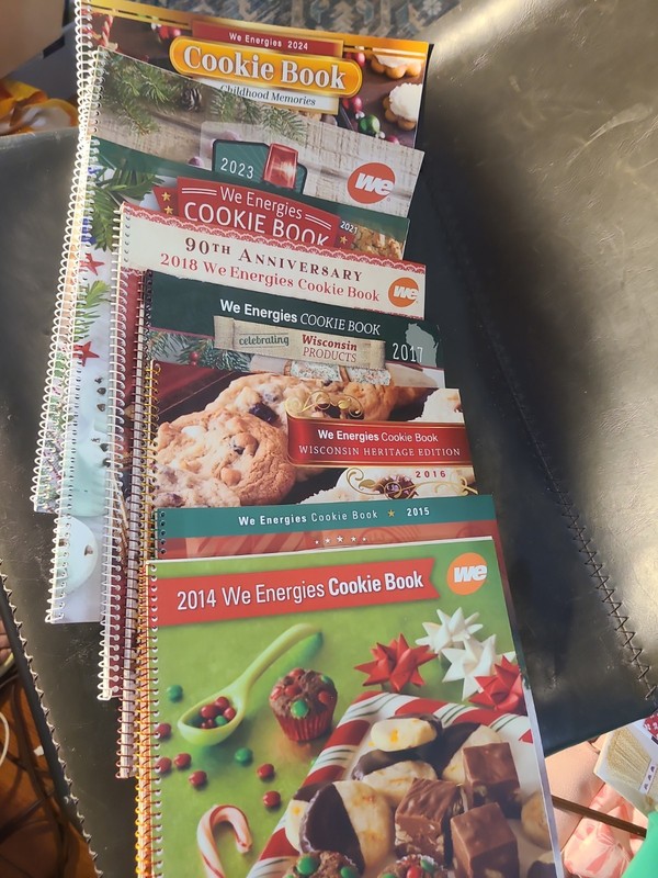 Set Of 8 We Energies Cookie Books 2014-2018 2021 2023 2024